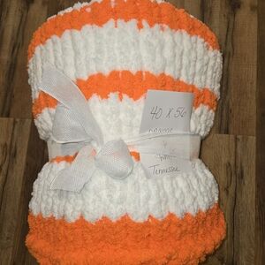 Orange and White Knitted Blanket